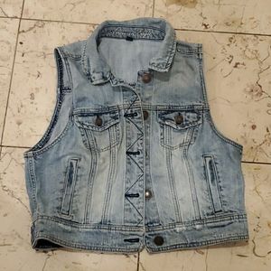 Distressed denim vest